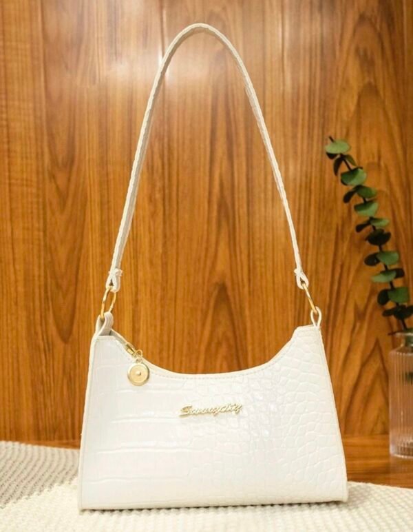 Bag con estampado de cocodrilo.